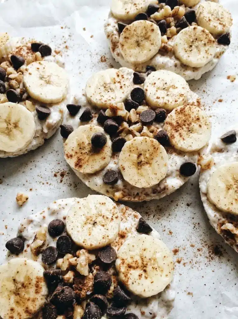 Half Baked Harvest Banana Yogurt Clusters with Dark Chocolate half baked harvest banana yogurt clusters with dark chocolate chips and walnuts on parchment